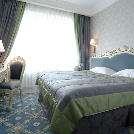 Royal Olympic Hotel Kiev Habitación foto